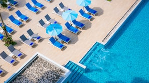 Outdoor pool, pool umbrellas, pool loungers