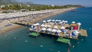 Private beach, sun loungers, beach umbrellas