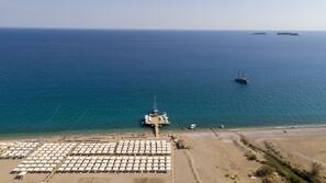 Private beach, sun loungers, beach umbrellas