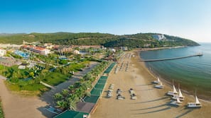 Private beach, sun loungers, beach umbrellas, beach towels