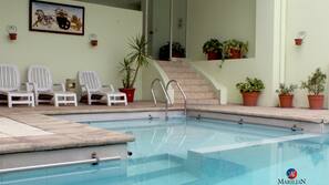 Outdoor pool, open 9 AM to 9 PM, sun loungers