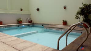 Outdoor pool, open 9 AM to 9 PM, sun loungers