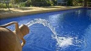 Seasonal outdoor pool, pool umbrellas, sun loungers
