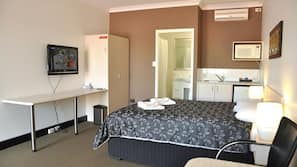 Premium bedding, iron/ironing board, free cribs/infant beds