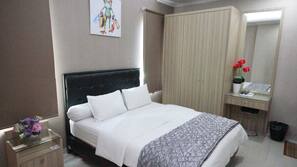 1 kamar tidur, minibar, meja kerja, dan setrika/meja setrika