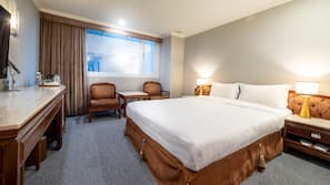 Premium bedding, laptop workspace, blackout drapes, iron/ironing board