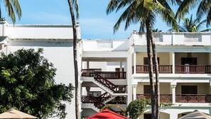 prideinn paradise resort beach spa pool umbrellas loungers pools outdoor