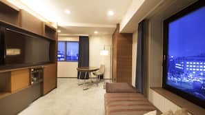 40-inch TV with satellite channels, pay movies