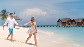 Private beach, white sand, free beach shuttle, sun-loungers