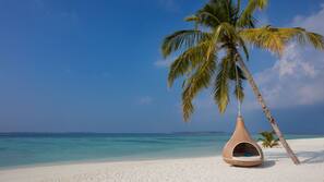 Private beach, white sand, free beach shuttle, sun-loungers