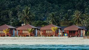 On the beach, sun-loungers, beach umbrellas, beach towels