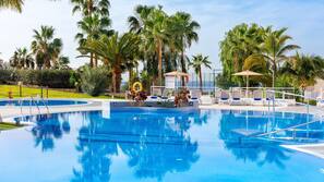 2 outdoor pools, pool umbrellas, pool loungers
