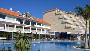2 outdoor pools, pool umbrellas, pool loungers