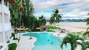 Outdoor pool, pool umbrellas, sun loungers