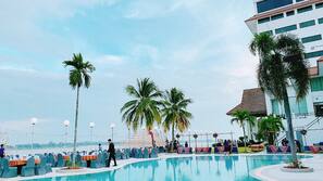 Outdoor pool, pool umbrellas, sun loungers