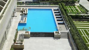 Outdoor pool, open 7:00 AM to 9:00 PM, pool umbrellas, sun loungers