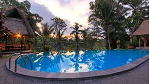 Outdoor pool, open 7:30 AM to 7:00 PM, pool umbrellas, pool loungers