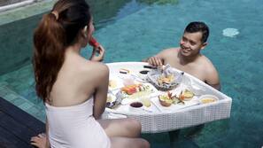 Outdoor pool, pool umbrellas, pool loungers
