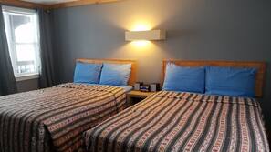Blackout drapes, iron/ironing board, bed sheets