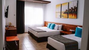 Premium bedding, down comforters, minibar, in-room safe