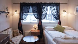 1 bedroom, desk, bed sheets