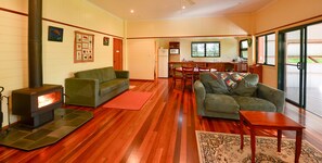 Kingfisher Cottage | Living room | Flat-screen TV, fireplace, DVD player, toys
