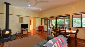 Birdwing Cottage | Living area | Flat-screen TV, fireplace, DVD player, toys