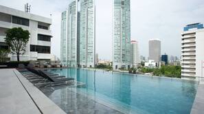 Outdoor pool, pool umbrellas, pool loungers