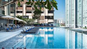 Outdoor pool, pool umbrellas, pool loungers