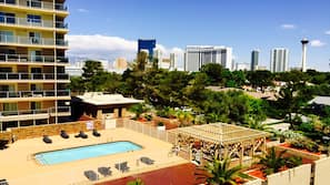 Seasonal outdoor pool, open 7:00 AM to 6:00 PM, sun loungers
