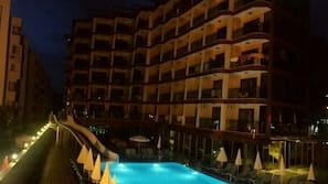 Indoor pool, outdoor pool, pool umbrellas, pool loungers
