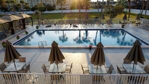 Outdoor pool, open 9 AM to 10 PM, free pool cabanas, pool umbrellas