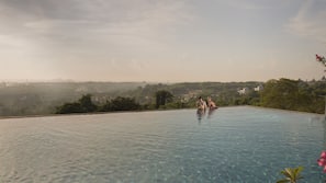 2 outdoor pools, pool umbrellas, pool loungers