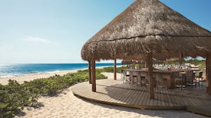 Private beach, white sand, sun loungers, beach umbrellas
