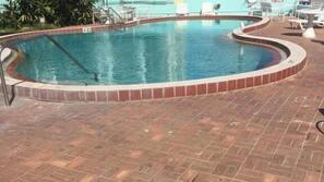 Outdoor pool, pool umbrellas, sun loungers
