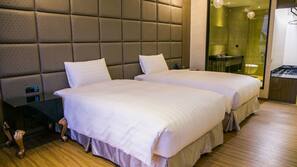 Premium bedding, down comforters, in-room safe, desk