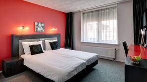 Luxe beddengoed, een kluis op de kamer, een bureau, gratis babybedden