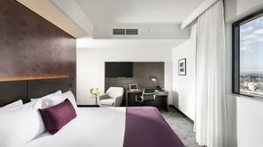Premium bedding, pillow top beds, minibar, in-room safe