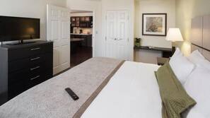 Desk, laptop workspace, iron/ironing board, free cribs/infant beds