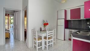Fridge, coffee/tea maker, cookware/dishes/utensils