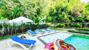 Indoor pool, outdoor pool, pool umbrellas, pool loungers
