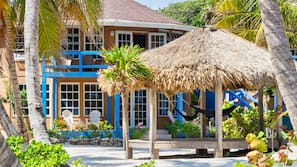 Private beach, white sand, sun loungers, beach umbrellas