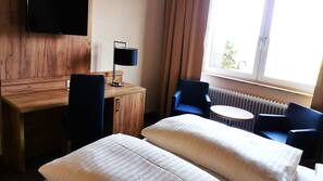 Hypo-allergenic bedding, in-room safe, desk, laptop workspace