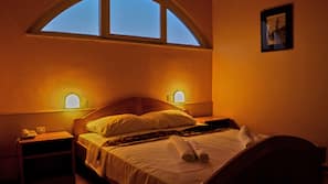 In-room safe, desk, iron/ironing board, free cribs/infant beds