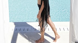 Seasonal outdoor pool, open 11:00 AM to 8:00 PM, free cabanas