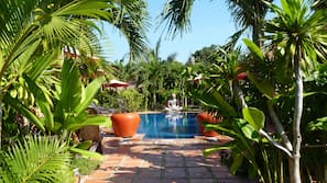 Outdoor pool, pool umbrellas, sun loungers