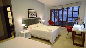 Premium bedding, down comforters, memory foam beds, in-room safe