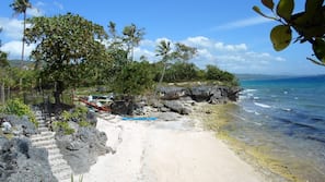 On the beach, white sand, beach towels, snorkeling