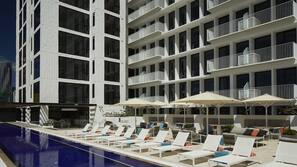 Outdoor pool, pool umbrellas, pool loungers