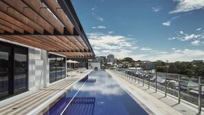 Outdoor pool, pool umbrellas, pool loungers